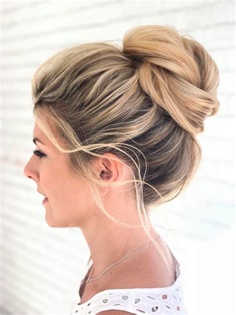 messy braid styles|high messy bun hairstyle.